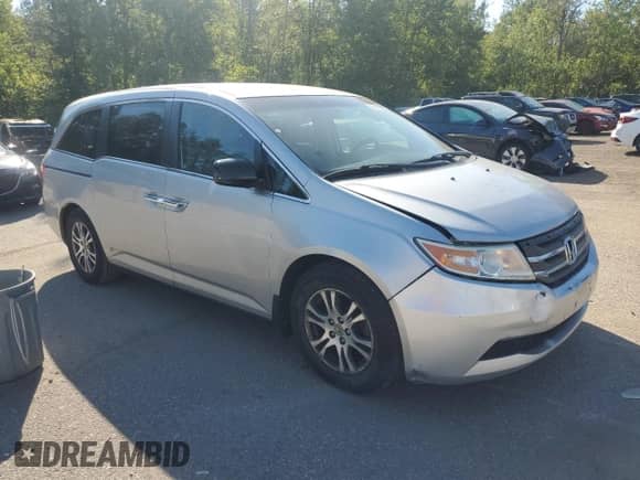 2012 Honda Odyssey EX z VIN 5FNRL5H4XCB509862, wystawiony jako Copart lot #70677345 z przebiegiem 239 345 mil mil oraz Czysty tytuł • Clean title. Historia ofert i sprzedaży dostępna na DreamBid. Obrazek 4.
