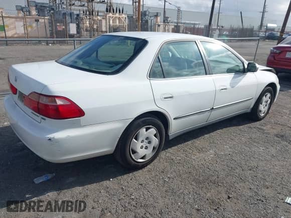 2000 Honda Accord LX with VIN 1HGCG1649YA095481, listed as a IAAI auction lot 41867406 with 218,765 mi miles and . Bid and sale history available at DreamBid. Image 4.