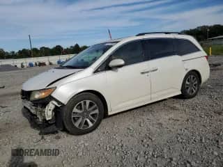 2014 Honda Odyssey Touring с VIN 5FNRL5H92EB126884, выставлен на аукционе Copart как лот 70121595 с пробегом 206 989 миль миль и Списание • Salvage title. История ставок и продаж доступна на DreamBid. Изображение 1.
