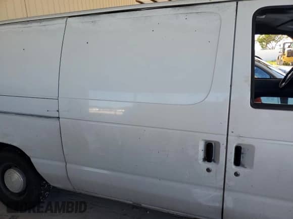 2002 Ford Econoline Cargo with VIN 1FTRE14292HB60778, listed as a Copart auction lot 74345234 with 173,366 mi miles and Salvage title. Bid and sale history available at DreamBid. Image 11.