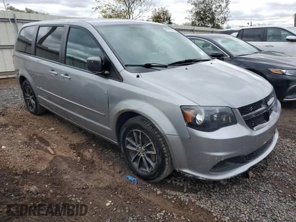 2015 Dodge Grand Caravan SE Plus with VIN 2C4RDGBG9FR569068, listed as a Copart auction lot 87242785 with 141,576 mi miles and Clean title. Bid and sale history available at DreamBid. Image 4.