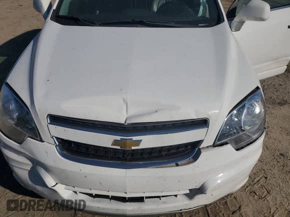 2014 Chevrolet Captiva Sport LTZ с VIN 3GNAL4EK4ES660272, выставлен на аукционе Copart как лот 81577065 с пробегом 113 222 миль миль и Списание • Salvage title. История ставок и продаж доступна на DreamBid. Изображение 12.