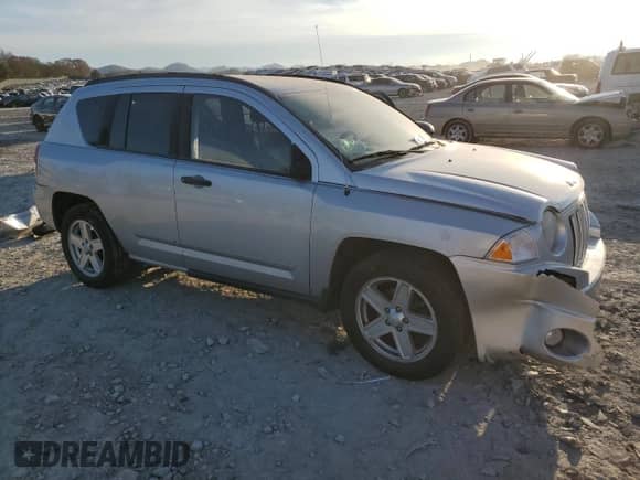 2010 Jeep Compass Sport z VIN 1J4NT1FB9AD626226, wystawiony jako Copart lot #82933784 z przebiegiem 191 772 mil mil oraz Szkoda całkowita • Salvage title. Historia ofert i sprzedaży dostępna na DreamBid. Obrazek 4.