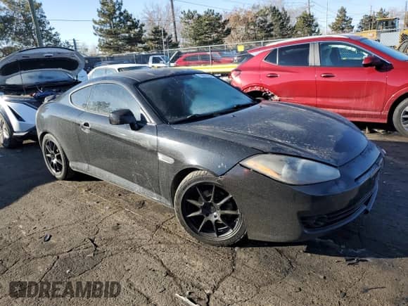 2008 Hyundai Tiburon GS с VIN KMHHM66D38U264513, выставлен на аукционе Copart как лот 42861755 с пробегом 187 895 миль миль и Списание • Salvage title. История ставок и продаж доступна на DreamBid. Изображение 4.