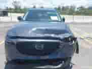 2023 Mazda CX-5 S Carbon Edition z VIN JM3KFBCM2P0200445, wystawiony jako IAAI lot #42745392 z przebiegiem 21 932 mil mil oraz . Historia ofert i sprzedaży dostępna na DreamBid. Obrazek 13.