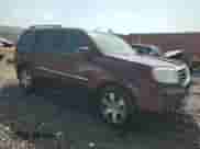 2014 Honda Pilot Touring with VIN 5FNYF4H94EB042322, listed as a Copart auction lot 81058455 with 66,678 mi miles and Salvage title. Bid and sale history available at DreamBid. Image 4.