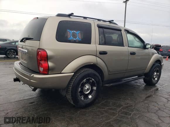 2005 Dodge Durango SLT z VIN 1D4HB48N45F567100, wystawiony jako Copart lot #87469905 z przebiegiem 268 378 mil mil oraz Czysty tytuł • Clean title. Historia ofert i sprzedaży dostępna na DreamBid. Obrazek 3.