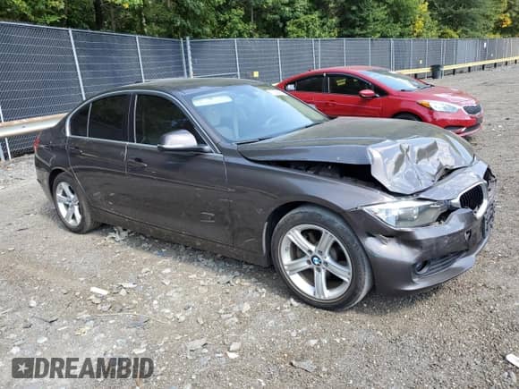 2015 BMW 3 Series 328i with VIN WBA3A5C5XFF607380, listed as a Copart auction lot 70839195 with 61,697 mi miles and Salvage title. Bid and sale history available at DreamBid. Image 4.