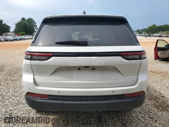 2023 Jeep Grand Cherokee Altitude with VIN 1C4RJGAG6PC587354, listed as a Copart auction lot 62698805 with 84,492 mi miles and Salvage title. Bid and sale history available at DreamBid. Image 6.