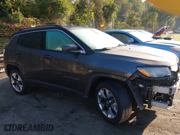 2019 Jeep Compass Limited with VIN 3C4NJDCB3KT842909, listed as a IAAI auction lot 43338860 with 100,667 mi miles and . Bid and sale history available at DreamBid. Image 14.