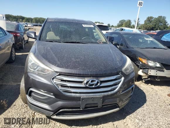 2018 Hyundai Santa Fe 2.4L z VIN 5XYZT3LB5JG560895, wystawiony jako Copart lot #85306865 z przebiegiem 137 576 mil mil oraz Czysty tytuł • Clean title. Historia ofert i sprzedaży dostępna na DreamBid. Obrazek 5.