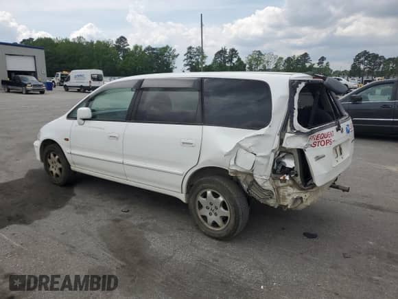 1998 Honda Odyssey with VIN 00000RA41011770, listed as a Copart auction lot 54150805 with 129,126 mi miles and Non repairable. Bid and sale history available at DreamBid. Image 2.