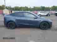 2022 Tesla Model Y Long Range z VIN 7SAYGDEE9NA018029, wystawiony jako IAAI lot #43211378 z przebiegiem 59 492 mil mil oraz . Historia ofert i sprzedaży dostępna na DreamBid. Obrazek 14.