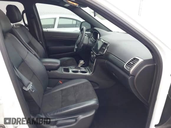 2021 Jeep Grand Cherokee Laredo E with VIN 1C4RJEAG7MC713026, listed as a IAAI auction lot 42010894 with 37,336 mi miles and . Bid and sale history available at DreamBid. Image 5.
