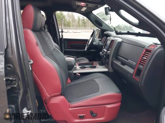 2018 Ram 1500 Rebel z VIN 1C6RR7YT2JS134820, wystawiony jako IAAI lot #40931182 z przebiegiem 56 427 mil mil oraz . Historia ofert i sprzedaży dostępna na DreamBid. Obrazek 5.