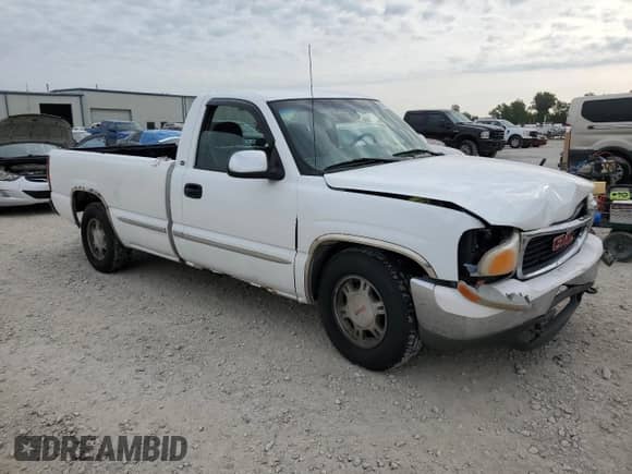 1999 GMC Sierra 1500 SL z VIN 1GTEC14V3XE544949, wystawiony jako Copart lot #68512264 z przebiegiem Nie podano mil oraz Szkoda całkowita • Salvage title. Historia ofert i sprzedaży dostępna na DreamBid. Obrazek 4.