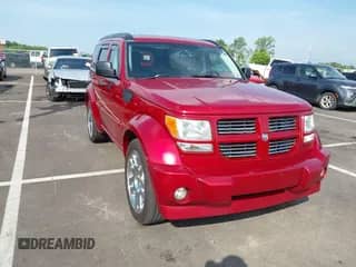 2008 Dodge Nitro R/T with VIN 1D8GU58678W102267, listed as a IAAI auction lot 42620907 with 186,937 mi miles and . Bid and sale history available at DreamBid. Image 1.