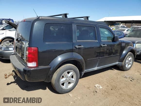 2008 Dodge Nitro SXT с VIN 1D8GU28K98W260170, выставлен на аукционе Copart как лот 73057114 с пробегом 244 438 миль миль и Чистый • Clean title. История ставок и продаж доступна на DreamBid. Изображение 3.