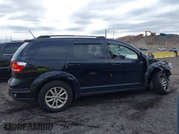 2017 Dodge Journey SXT with VIN 3C4PDCBG0HT590925, listed as a IAAI auction lot 43444981 with 99,244 mi miles and . Bid and sale history available at DreamBid. Image 13.