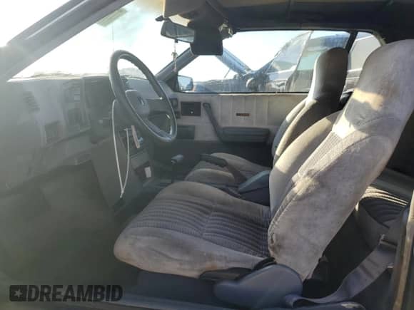 1989 Chevrolet Cavalier с VIN 1G1JF31W1K7190840, выставлен на аукционе Copart как лот 77747934 с пробегом Не указан миль и Списание • Salvage title. История ставок и продаж доступна на DreamBid. Изображение 7.