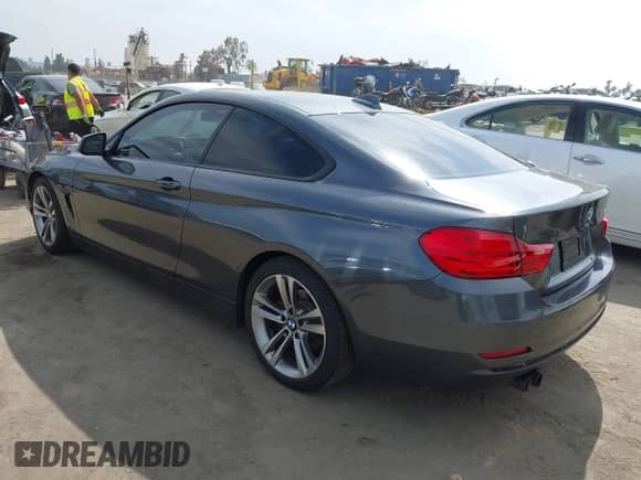 2014 BMW 4 Series 428i with VIN WBA3N7C5XEF718428, listed as a IAAI auction lot 42043910 with 157,686 mi miles and . Bid and sale history available at DreamBid. Image 3.