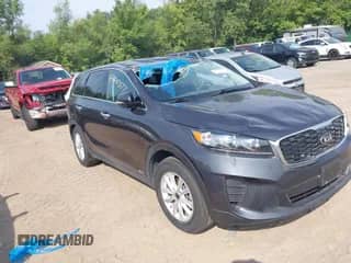 2019 Kia Sorento LX with VIN 5XYPGDA51KG522810, listed as a IAAI auction lot 43000577 with 98,934 mi miles and . Bid and sale history available at DreamBid. Image 1.
