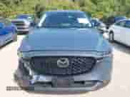 2025 Mazda CX-5 S Carbon Edition z VIN JM3KFBCM7S0587633, wystawiony jako IAAI lot #43335056 z przebiegiem 20 088 mil mil oraz . Historia ofert i sprzedaży dostępna na DreamBid. Obrazek 12.