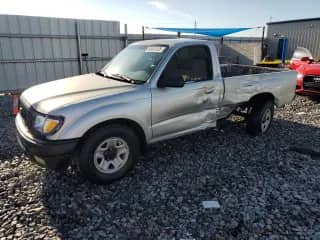 2004 Toyota Tacoma with VIN 5TENL42N44Z324085, listed as a Copart auction lot 68491595 with 180,905 mi miles and Salvage title. Bid and sale history available at DreamBid. Image 1.