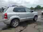 2009 Hyundai Tucson Limited with VIN KM8JN72D19U936404, listed as a Copart auction lot 57335465 with 105,110 mi miles and Salvage title. Bid and sale history available at DreamBid. Image 3.