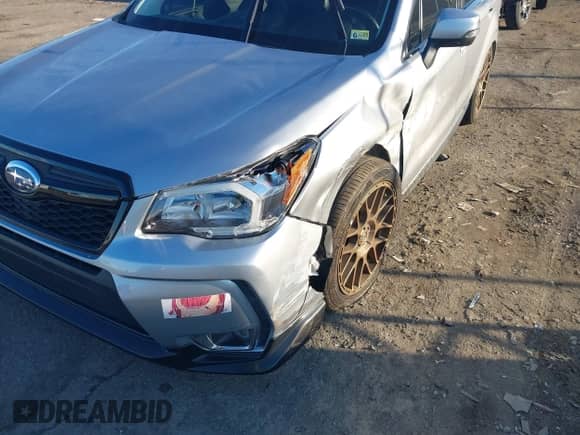 2016 Subaru Forester XT Touring z VIN JF2SJGXCXGH482715, wystawiony jako IAAI lot #41211792 z przebiegiem 95 610 mil mil oraz . Historia ofert i sprzedaży dostępna na DreamBid. Obrazek 6.