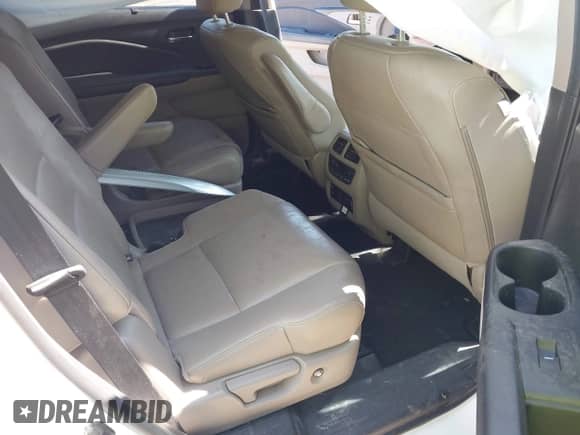 2021 Honda Pilot Touring 7-Passenger z VIN 5FNYF5H62MB011807, wystawiony jako IAAI lot #43367010 z przebiegiem Nie podano mil oraz . Historia ofert i sprzedaży dostępna na DreamBid. Obrazek 8.