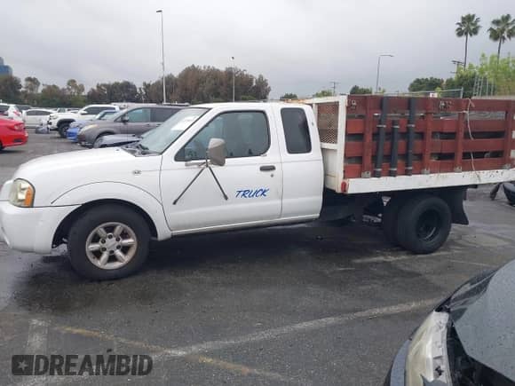 2003 Nissan Frontier XE z VIN 1N6DD26T03C458432, wystawiony jako IAAI lot #41799157 z przebiegiem 181 069 mil mil oraz . Historia ofert i sprzedaży dostępna na DreamBid. Obrazek 14.