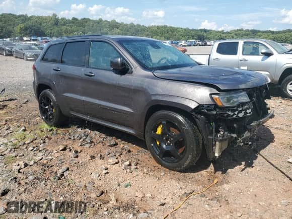 2021 Jeep Grand Cherokee Trackhawk z VIN 1C4RJFN93MC757896, wystawiony jako Copart lot #64594125 z przebiegiem 9 400 mil mil oraz Szkoda całkowita • Salvage title. Historia ofert i sprzedaży dostępna na DreamBid. Obrazek 4.