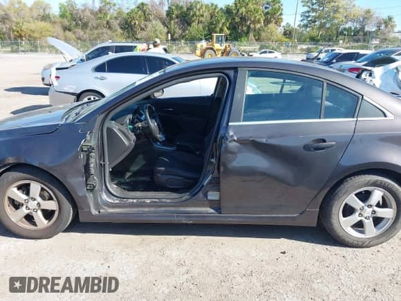2014 Chevrolet Cruze 1LT with VIN 1G1PD5SB5E7167394, listed as a IAAI auction lot 41795007 with Not provided miles and . Bid and sale history available at DreamBid. Image 14.