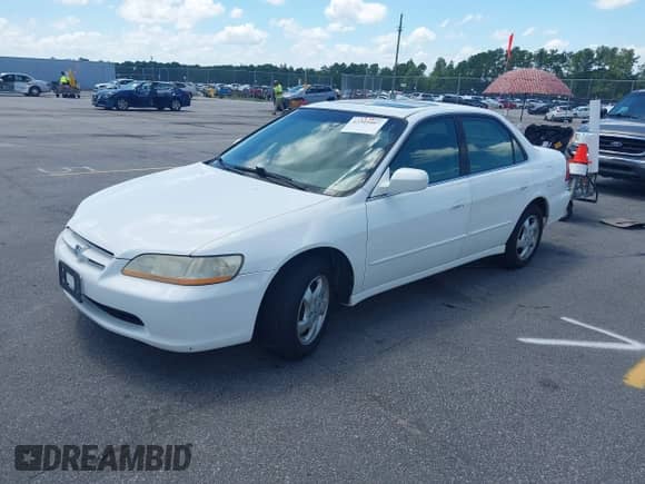 2000 Honda Accord EX with VIN 1HGCG5661YA007791, listed as a IAAI auction lot 42549407 with 150,238 mi miles and . Bid and sale history available at DreamBid. Image 2.