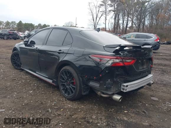 2024 Toyota Camry TRD with VIN 4T1KZ1AK0RU089655, listed as a IAAI auction lot 41040896 with 13,762 mi miles and . Bid and sale history available at DreamBid. Image 3.