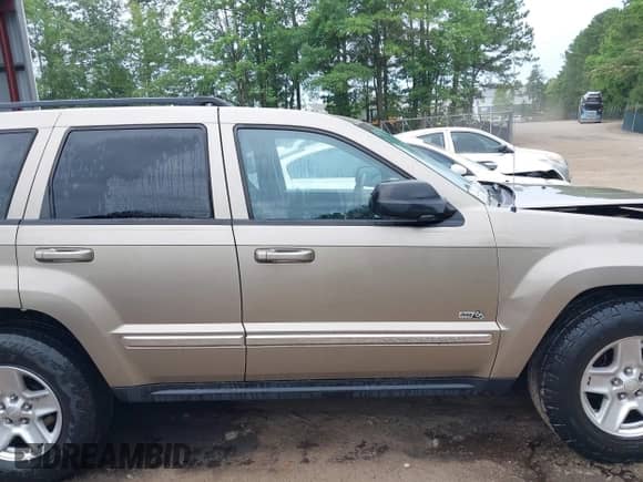2006 Jeep Grand Cherokee Laredo z VIN 1J4GS48K96C329772, wystawiony jako IAAI lot #42492434 z przebiegiem 285 257 mil mil oraz . Historia ofert i sprzedaży dostępna na DreamBid. Obrazek 13.