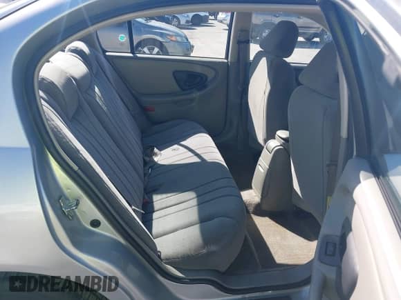 2005 Chevrolet Malibu Classic z VIN 1G1ND52F15M216618, wystawiony jako IAAI lot #43475248 z przebiegiem 98 129 mil mil oraz . Historia ofert i sprzedaży dostępna na DreamBid. Obrazek 8.