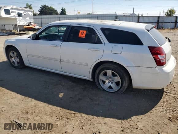 2006 Dodge Magnum with VIN 2D4FV47V46H378592, listed as a Copart auction lot 69456074 with 219,601 mi miles and Salvage title. Bid and sale history available at DreamBid. Image 2.