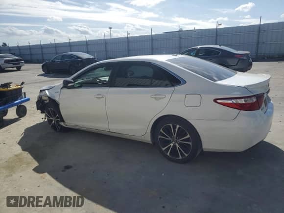 2017 Toyota Camry Hybrid XLE с VIN 4T1BD1FK5HU221640, выставлен на аукционе Copart как лот 82326065 с пробегом 80 588 миль миль и Списание • Salvage title. История ставок и продаж доступна на DreamBid. Изображение 2.