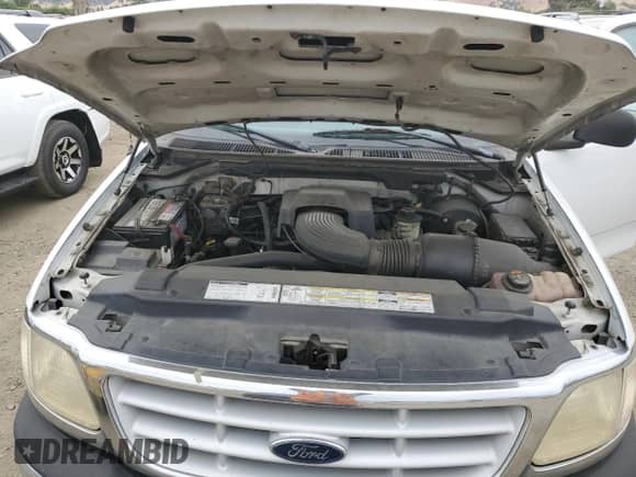 1999 Ford F-150 XL с VIN 1FTRF17L3XKA66147, выставлен на аукционе Copart как лот 69105514 с пробегом 179 426 миль миль и Чистый • Clean title. История ставок и продаж доступна на DreamBid. Изображение 11.