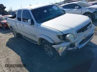 2002 Toyota Tundra Limited z VIN 5TBBT48172S248940, wystawiony jako IAAI lot #41479404 z przebiegiem 308 918 mil mil oraz . Historia ofert i sprzedaży dostępna na DreamBid. Obrazek 1.