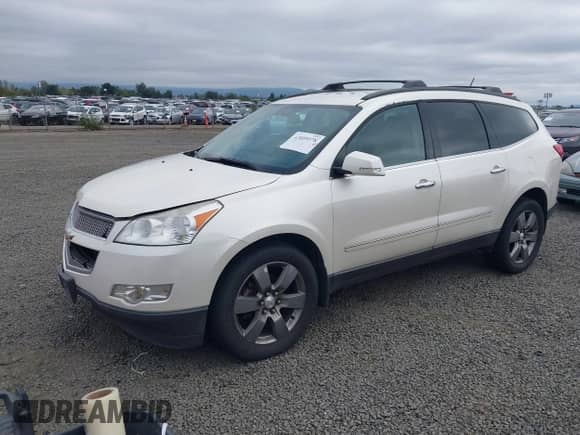 2011 Chevrolet Traverse LTZ with VIN 1GNKVLED2BJ410861, listed as a IAAI auction lot 43089578 with 188,672 mi miles and . Bid and sale history available at DreamBid. Image 2.