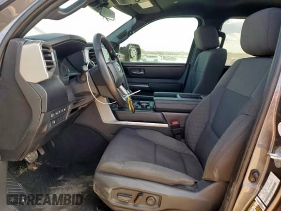 2025 Toyota Tundra SR with VIN 5TFLA5AB2SX044616, listed as a Copart auction lot 82146585 with 12,721 mi miles and Salvage title. Bid and sale history available at DreamBid. Image 7.