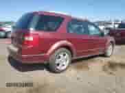 2006 Ford Freestyle Limited with VIN 1FMDK06136GA08228, listed as a Copart auction lot 69879995 with 214,776 mi miles and Salvage title. Bid and sale history available at DreamBid. Image 3.