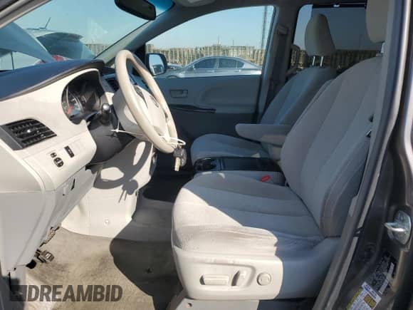 2014 Toyota Sienna LE AAS with VIN 5TDKK3DC5ES456637, listed as a Copart auction lot 87417215 with 103,902 mi miles and Salvage title. Bid and sale history available at DreamBid. Image 7.