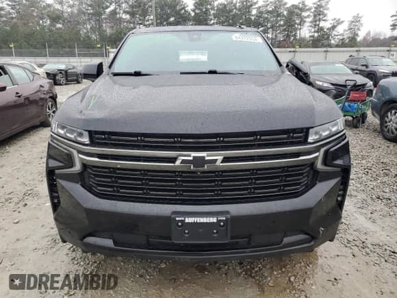 2021 Chevrolet Suburban RST с VIN 1GNSKEKD4MR210450, выставлен на аукционе Copart как лот 84372054 с пробегом 98 560 миль миль и Списание • Salvage title. История ставок и продаж доступна на DreamBid. Изображение 5.