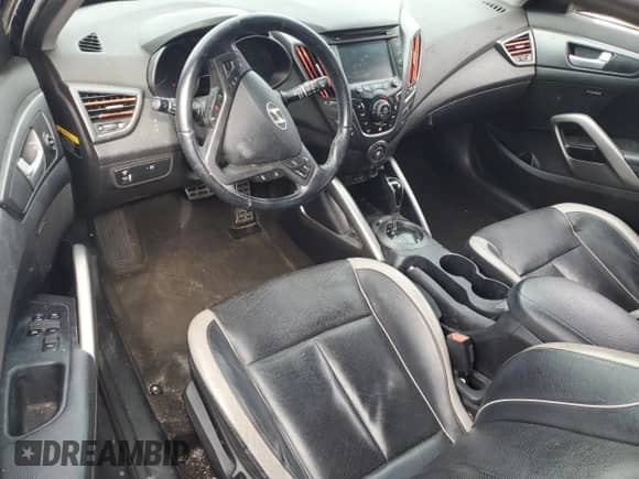 2013 Hyundai Veloster Turbo с VIN KMHTC6AE4DU171846, выставлен на аукционе Copart как лот 69561135 с пробегом Не указан миль и На запчасти • Non repairable. История ставок и продаж доступна на DreamBid. Изображение 8.