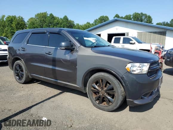 2013 Dodge Durango R/T with VIN 1C4SDJCTXDC697478, listed as a Copart auction lot 69072745 with 153,529 mi miles and Clean title. Bid and sale history available at DreamBid. Image 4.