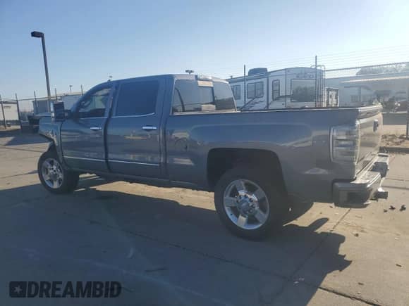 2016 Chevrolet Silverado 2500HD LTZ with VIN 1GC1KWE89GF212001, listed as a Copart auction lot 71680865 with 106,260 mi miles and Salvage title. Bid and sale history available at DreamBid. Image 2.